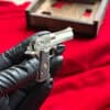 Detailed full metal miniature Desert Eagle slide gun with wood grips