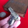 Detailed full metal miniature Desert Eagle slide gun with wood grips