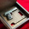 Detailed full metal miniature Desert Eagle slide gun with wood grips