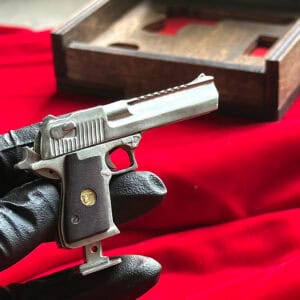Detailed full metal miniature Desert Eagle slide gun with wood grips