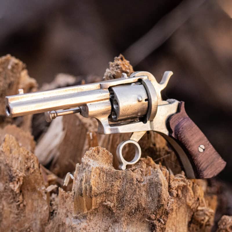 The miniature pinfire revolver Lefaucheux with wooden grips.