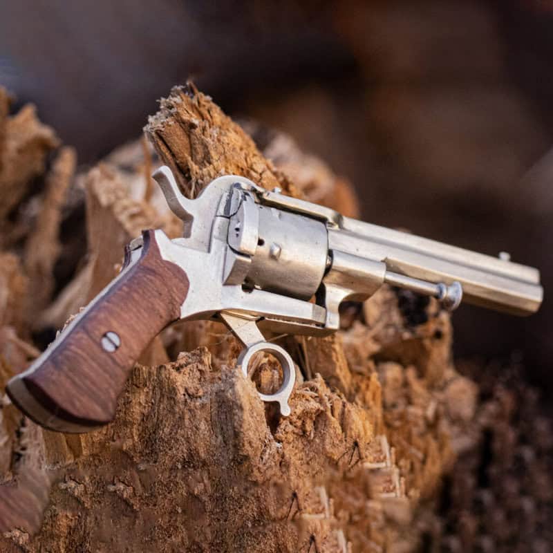 The miniature pinfire revolver Lefaucheux with wooden grips.