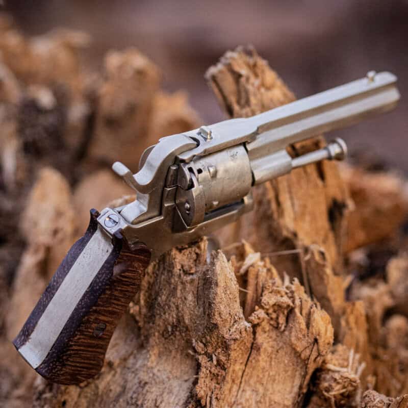 The miniature pinfire revolver Lefaucheux with wooden grips.