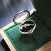 Silver Locket Ring with Glass — opened, with Miniature Derringer Pistol inside