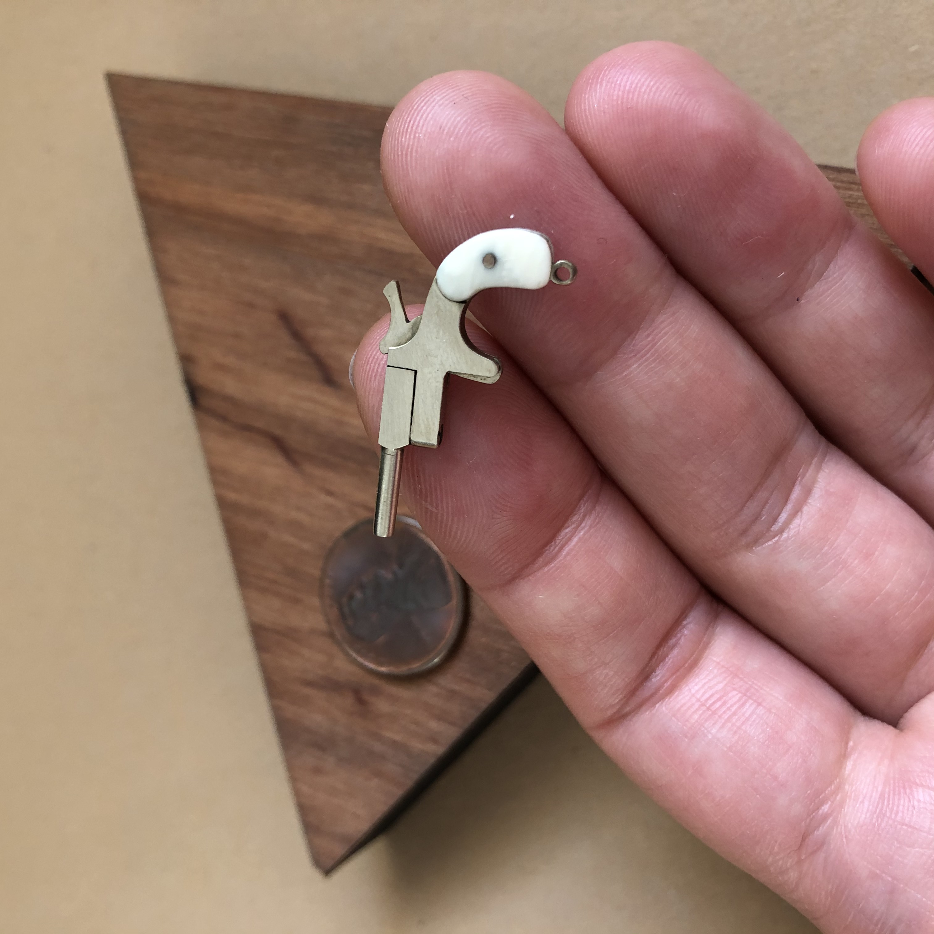 Мініатюрний нікелірований Derringer (масштаб 1:6)