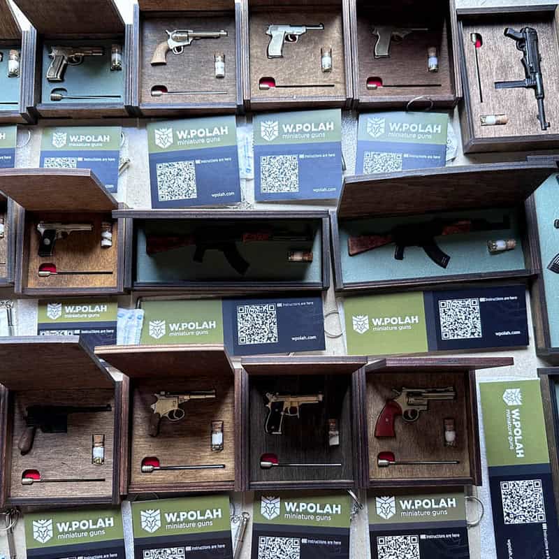 Wooden box for storing miniature gun for each of models