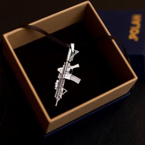 A detailed silver-colored HK416 rifle pendant with a dark leather cord, presented inside a square jewelry box with a black velvet interior.