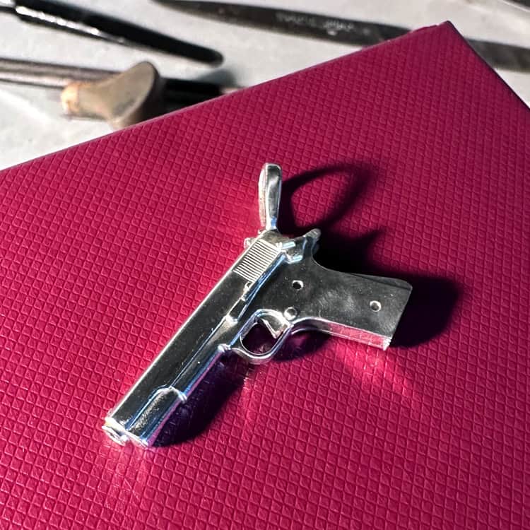 Silver Pendant in the Shape of Colt 1911