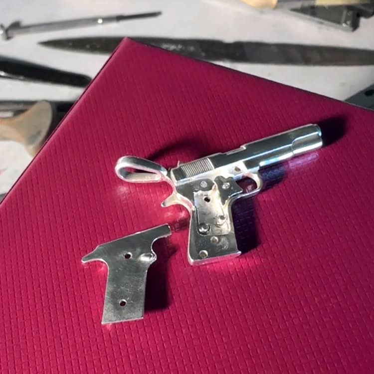 Silver Pendant in the Shape of Colt 1911