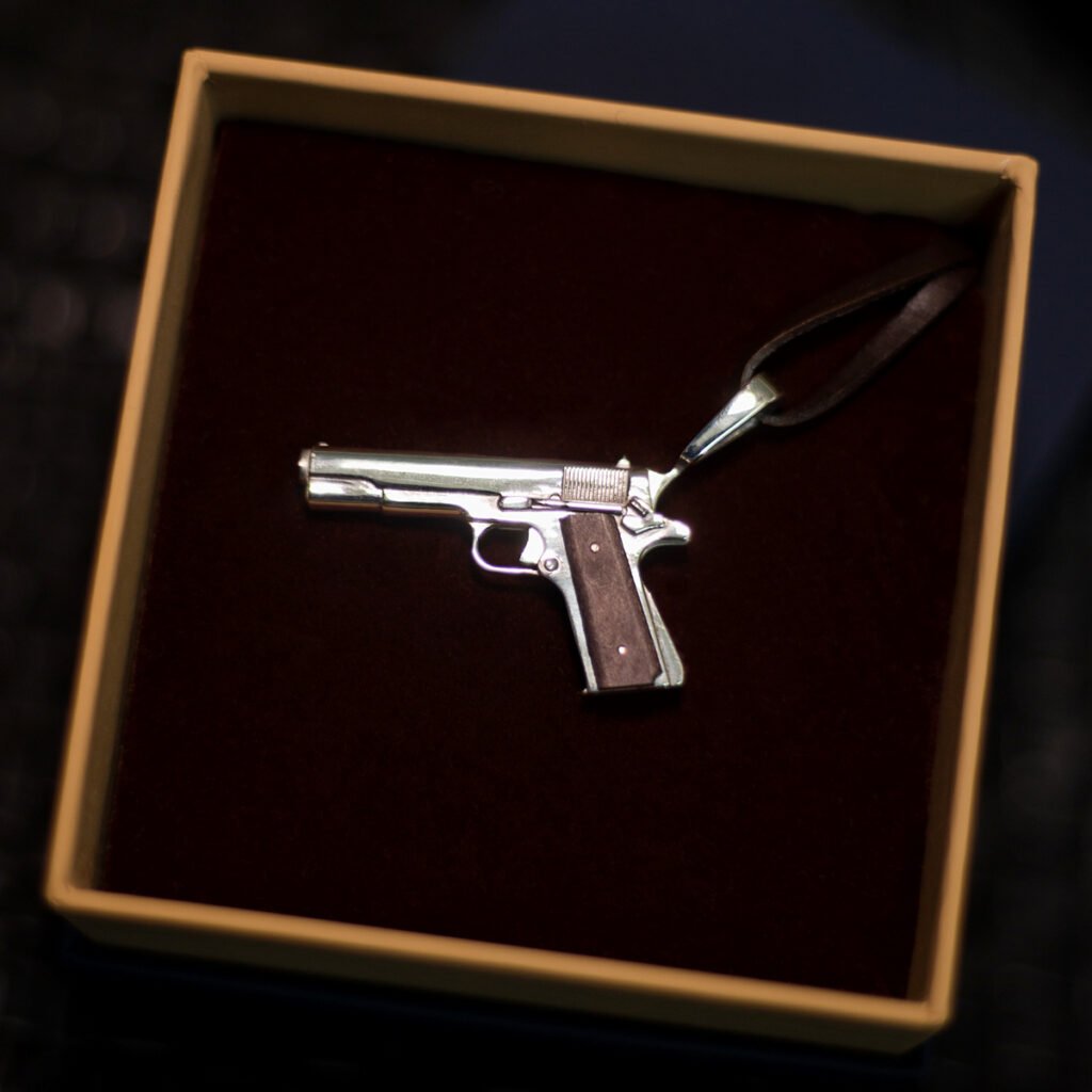 Miniature silver Colt 1911 pendant