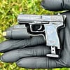 Heckler & Koch USP - a semi-automatic pistol with laser sight