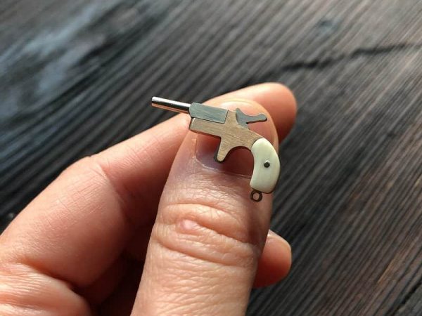 Golden-0.8mm-Derringer-Pistol.jpg Golden 0.8mm Derringer Pistol (scale 1:10)