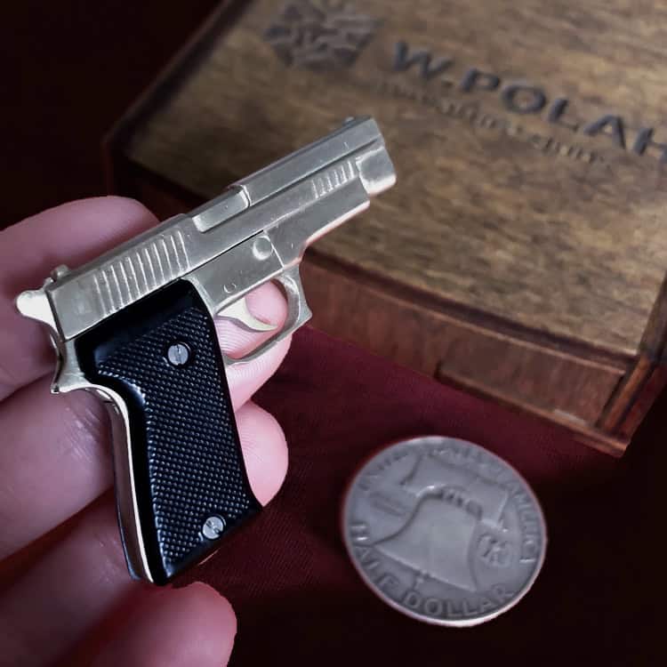 SIG Sauer P220 with black grips (scale 1:4)