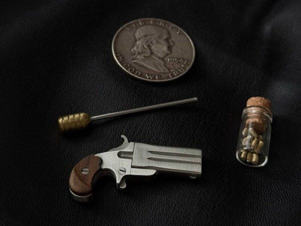 Swivel-Frank-Wesson-Derringer-scaled-e1770449898765.jpg Frank Wesson Derringer